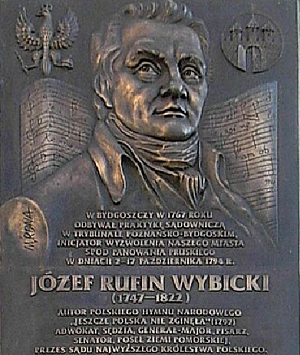 Tablica pamiątkowa na ścianie budynku Biblioteki Miejskiej w Bydgoszczy.