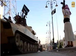 Terroryci ISIS w Afryce (Zrzut z ekranu wideo https://www.youtube.com/watch?v=4OKXk3Q3XW0 )