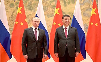 Co zrobiłby rosyjski prezydent Władimir Putin, gdyby Chiny najechały Rosję, by odzyskać panowanie nad terytorium, które kiedyś było chińskie? Na zdjęciu: Putin (po lewej) i chiński prezydent Xi Jinping spotykają się w Pekinie 4 lutego 2022 r. (Źródło: Wikipedia)