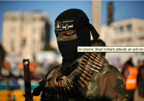  Bojówkarz Islamskiego Dżihadu na wiecu antyizraelskim w Rafah.. (zdjęcie: REUTERS)