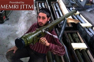 Rebeliant syryjski pokazujcy naramienn wyrzutni rakiet 