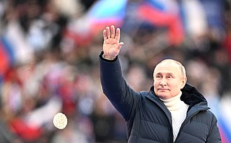 <span>Rosyjski prezydent Władimir Putin wygłasza przemówienie z okazji rocznicy „zjednoczenia” Krymu z Rosją, marzec 2022 (Źródło: Wikipedia)</span>