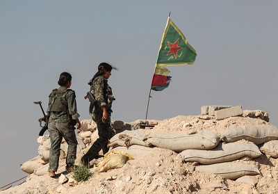 Na zdjciu: Bojowniczki kurdyjskich Powszechnych Jednostek Obrony (YPG) w pobliu miasta Kobane w Syrii, 20 czerwca 2015. (Zdjcie: Ahmet Sik/Getty Images)