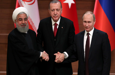 Prezydenci Hassan Rouhani, Tayyip Erdogan Wadimir Putin na wspólnej konferencji prasowej w Ankarze 4 kwietnia 2018. (Zdjcie: UMIT BEKTAS / REUTERS)