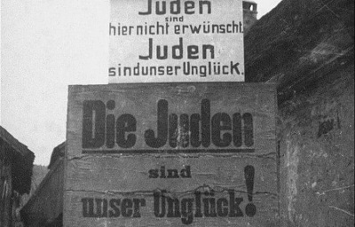 A sign on a fence “Jews are not welcome here. The Jews are our misfortune” (Germany, around 1935). Source: United States Holocaust Memorial Museum.