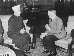 <span>Zaoyciel ruchu palestyskiego w okresie poprzedzajcym drug wojn wiatow by dumnym nazist i przyjacielem Adolfa Hitlera. To wielki mufti Jerozolimy, Had Amin al-Husseini, zmieni spór arabsko-ydowski z dajcego si rozwiza konfliktu o ziemi w nierozwizywalny konflikt o religi. Na zdjciu: Hitler spotyka si z Husseinim 28 listopada 1941 r. (ródo zdjcia: Niemieckie Archiwum Federalne)</span>