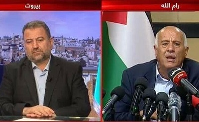 Prezydent Autonomii Palestyskiej, Mahmoud Abbas i jego rzdzca frakcja, Fatah, przymilaj si teraz do swoich rywali w Hamasie – krok, który moe przynie efekt odwrotny od zamierzonego i utorowa drog do olbrzymiej przemocy antyizraelskiej. Na zdjciu: wysoki rang funkcjonariusz Fatahu, Dibril Radoub, w Ramallah, uczestniczy w wideo-konferencji z wiceprzewodniczcym Hamasu, Salehem Arourim, 2 lipca 2020. (Zrzut z ekranu: Palestinian TV)